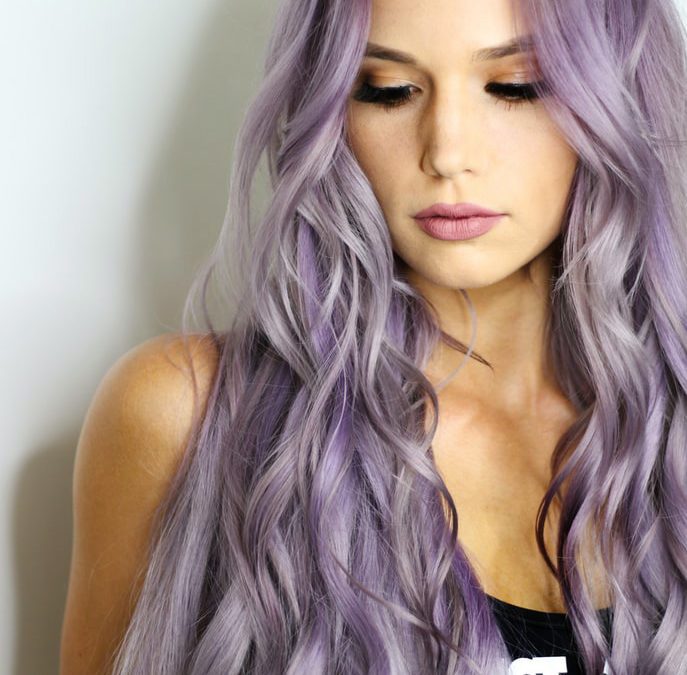 woman with pastel purple wavy hair